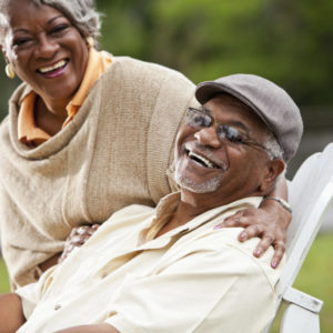 Portrait of stylish senior African American couple.  Focus on man (60s).